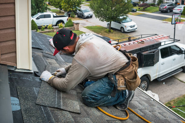 Professional Roofing technician working in Avon, NY